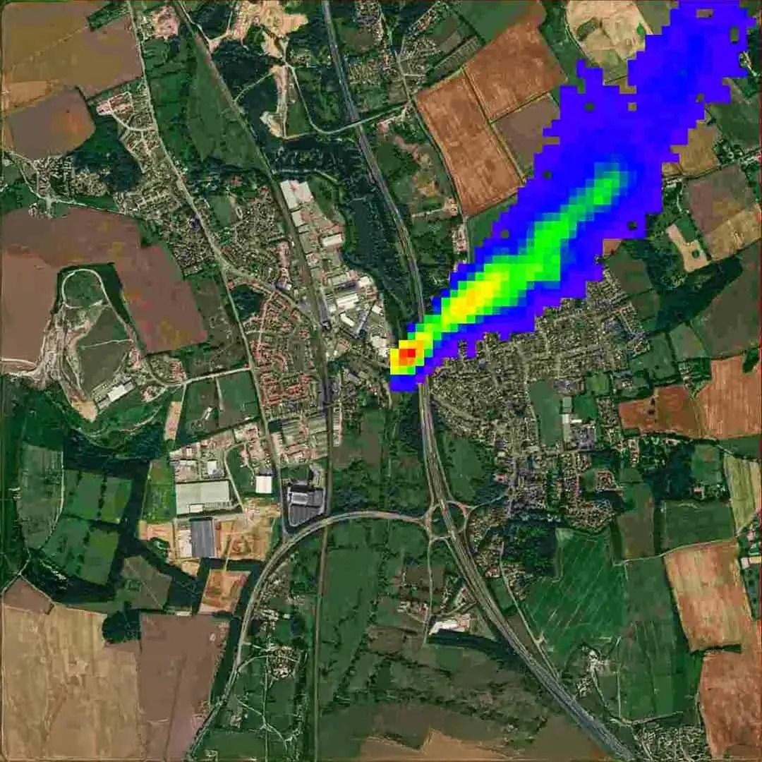 Methane plume drifting over a town and farmland