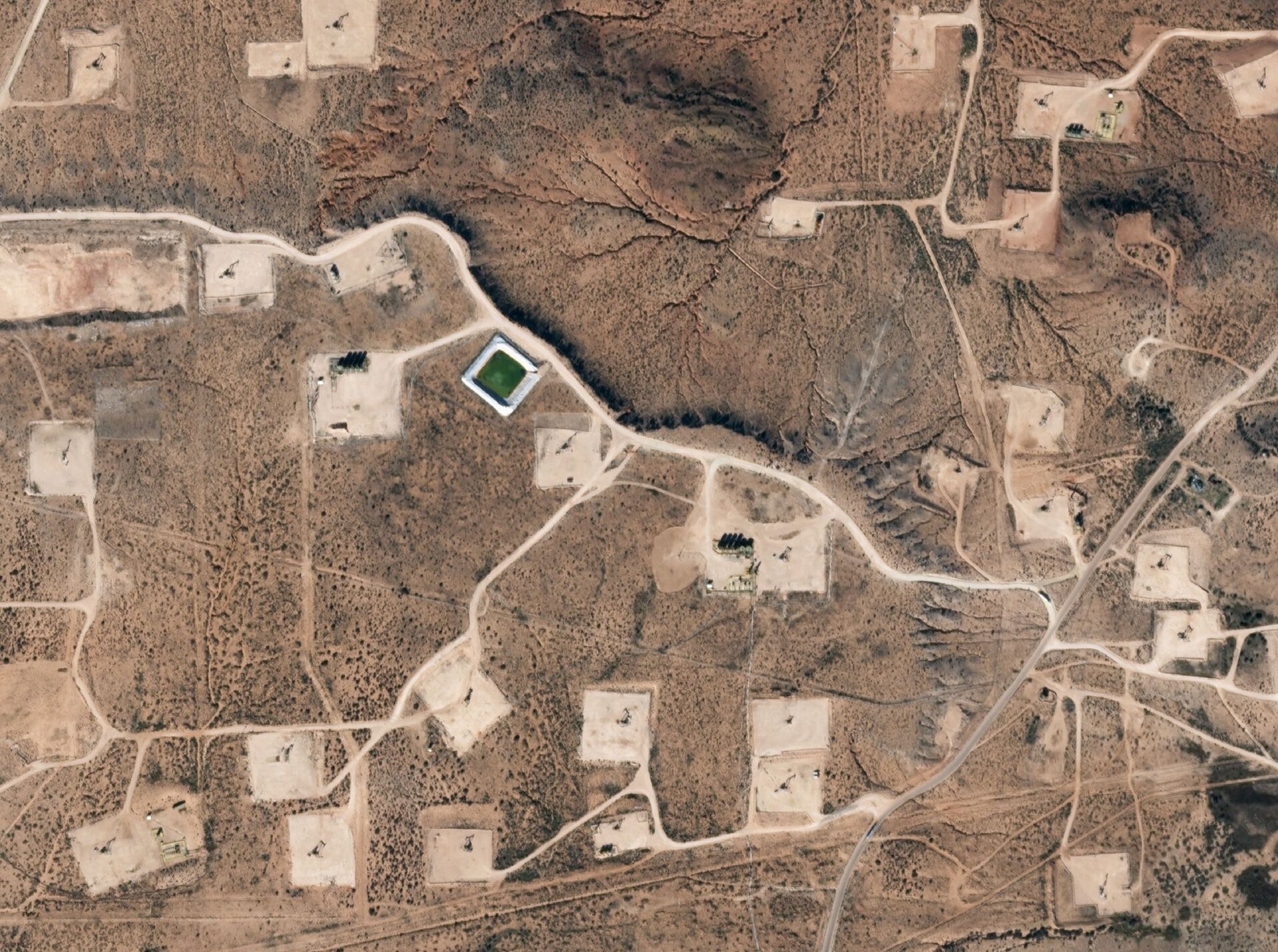 Well pads and access roads