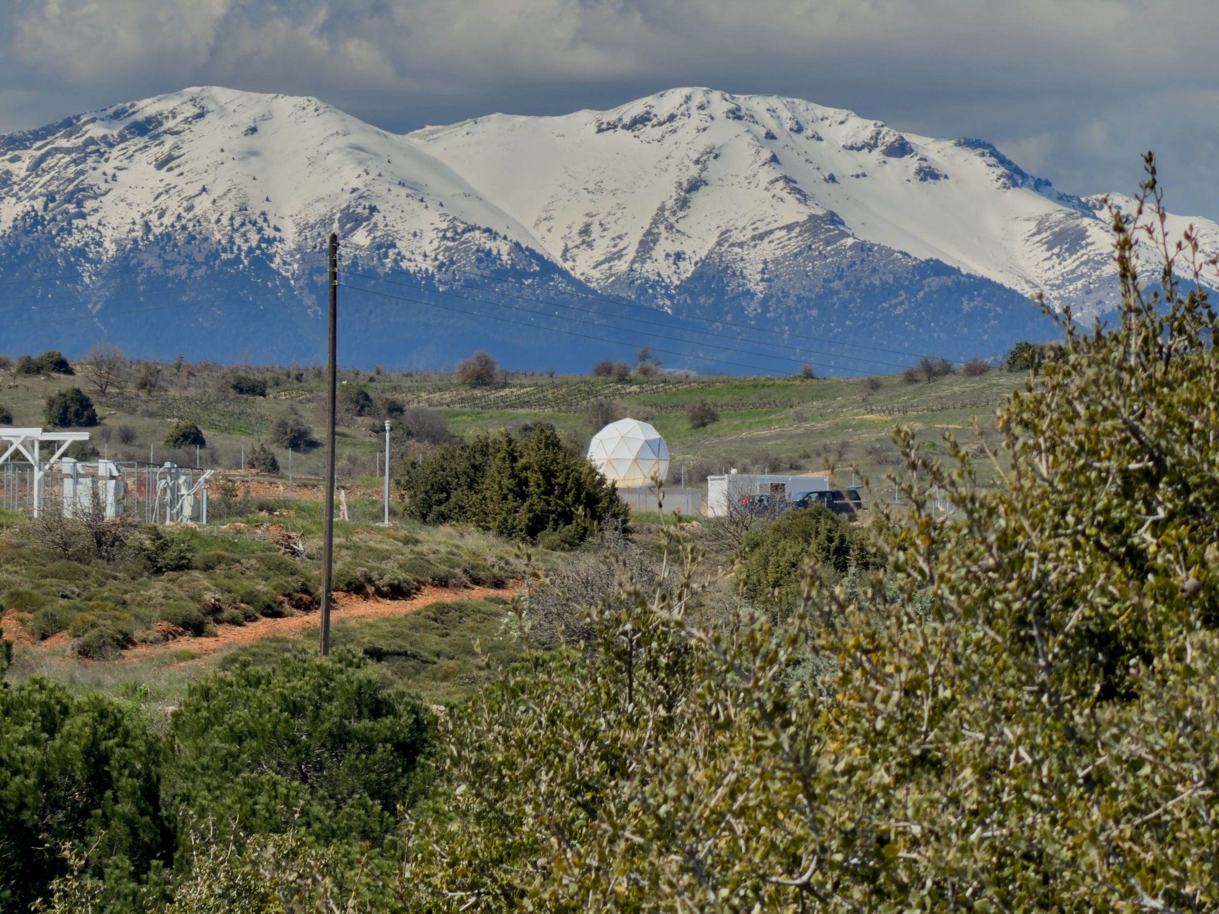 The radome at NOA Kryoneri, mountains behind
