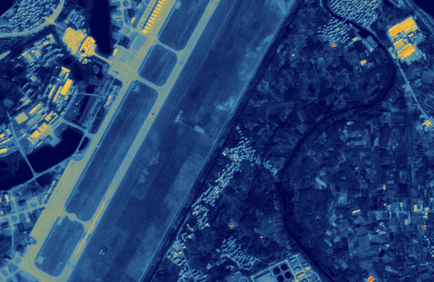 Airfield in mid-wave infrared, warm hangars and aprons